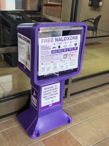 A Purple Naloxone Vending Box in the Kendall County Health Department Vestibule